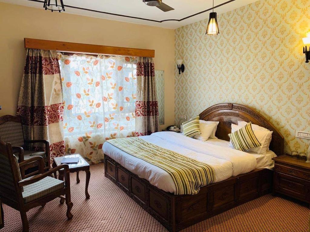 Postel nebo postele na pokoji v ubytování The Shelter Heritage A Boutique Hotel