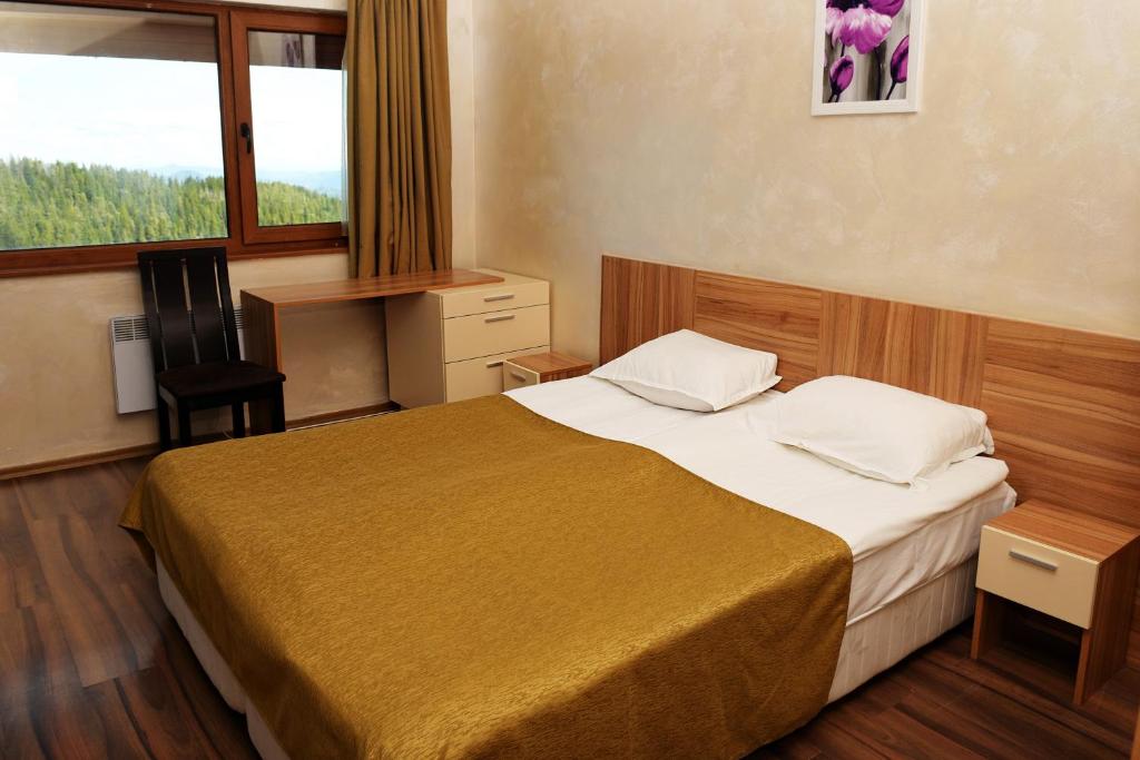 Postel nebo postele na pokoji v ubytování Forest Nook Aparthotel