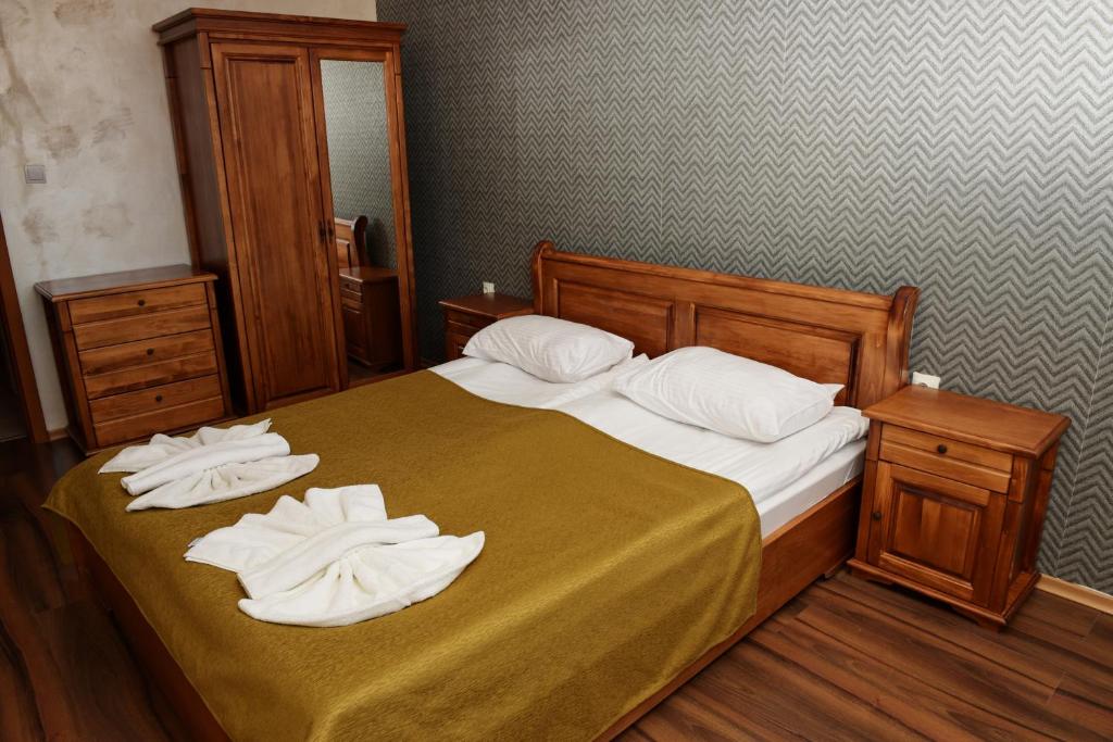 Postel nebo postele na pokoji v ubytování Forest Nook Aparthotel