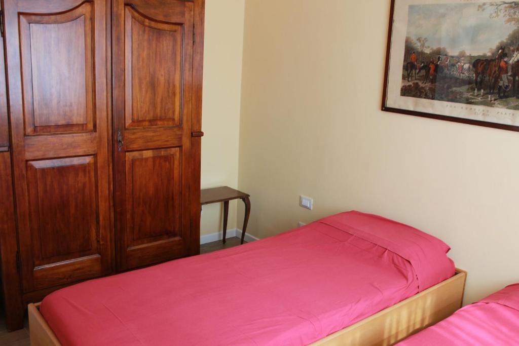 A bed or beds in a room at Cà Dea