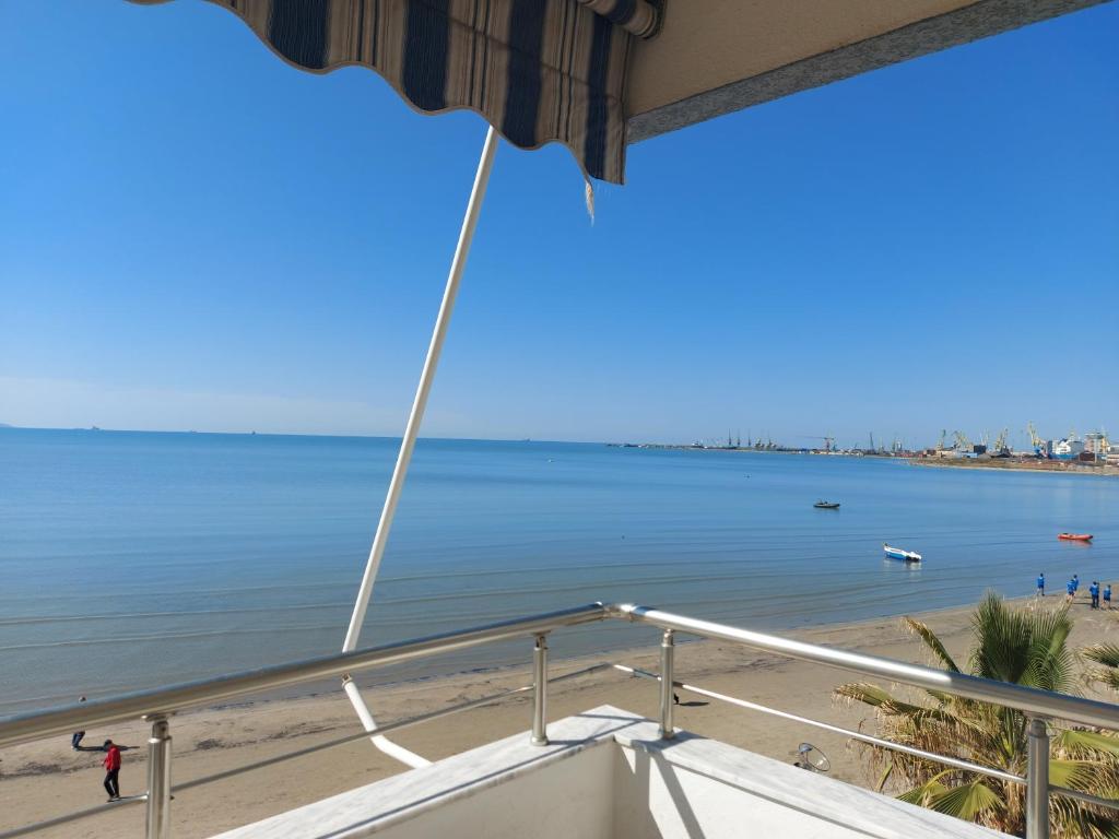 a view of the beach from the balcony of a boat at Bral Apartments 4 in Durrës