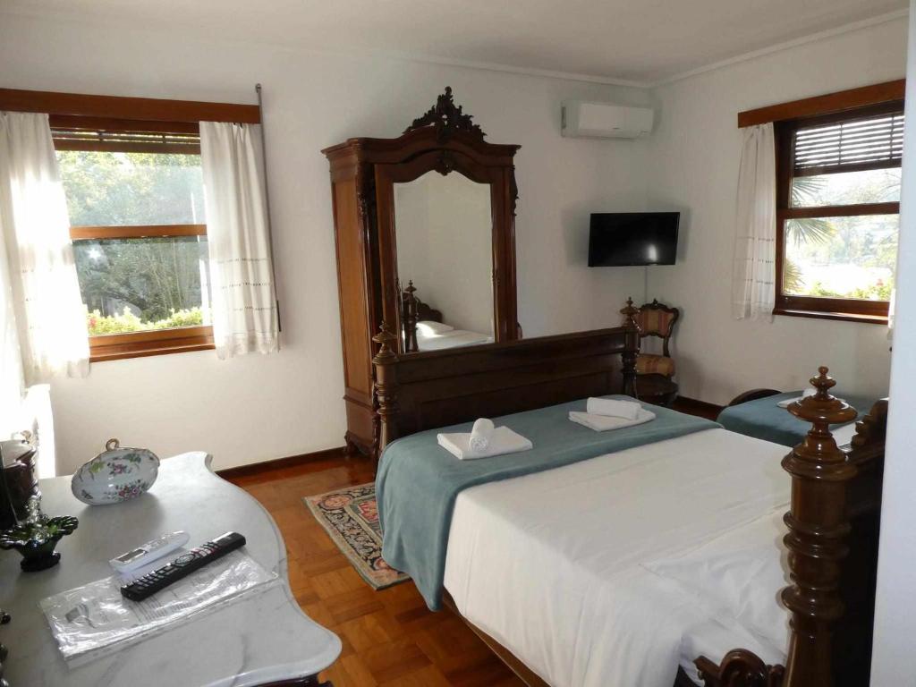Uma cama ou camas num quarto em Casa do Ribeirinho
