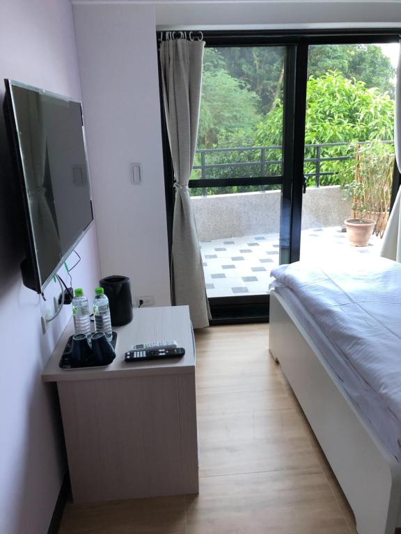 Postel nebo postele na pokoji v ubytování Lucky House B&B