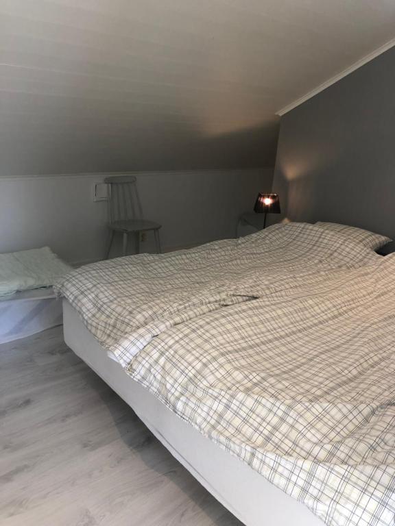Postel nebo postele na pokoji v ubytování Östernäs