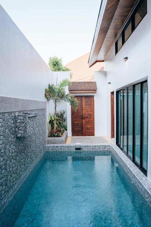 Bazén v ubytování Poonsiri Varich Pool Villa Aonang nebo v jeho okolí