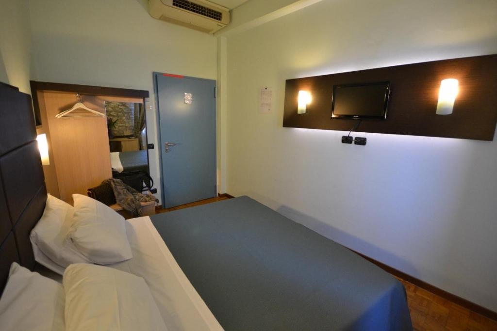 Cama ou camas em um quarto em Hotel Il Castello