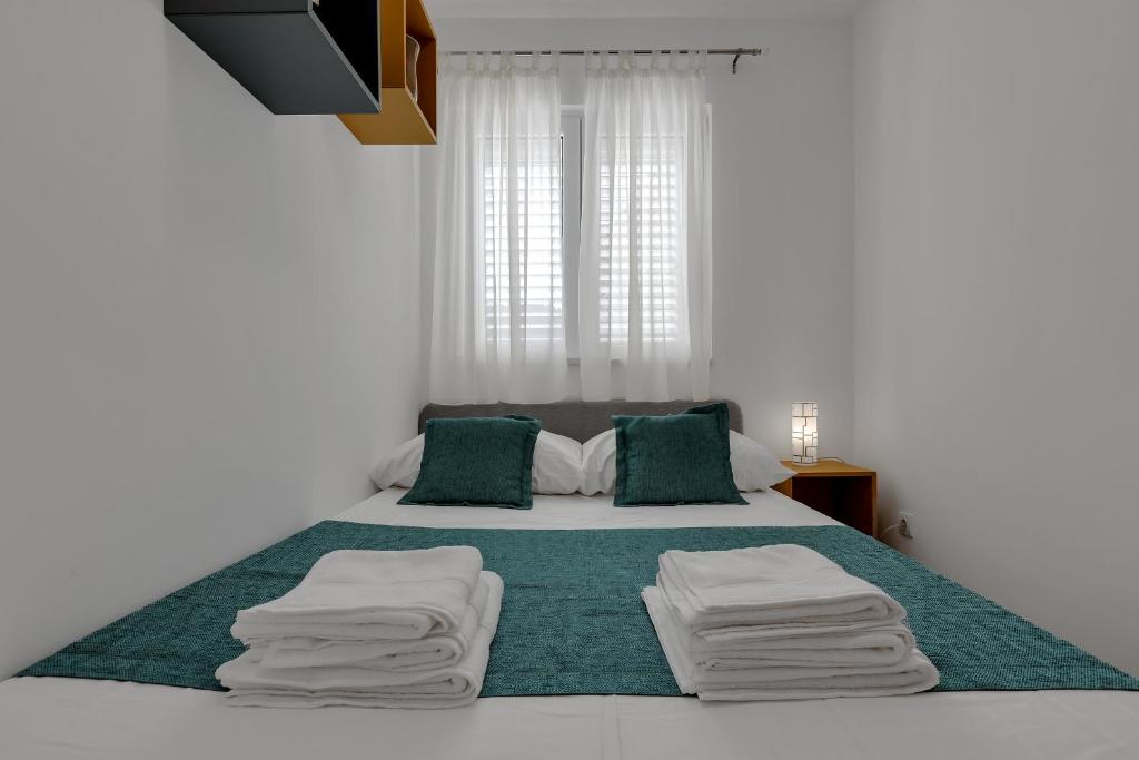 Posteľ alebo postele v izbe v ubytovaní Apartment PINE FINE with FREE PARKING
