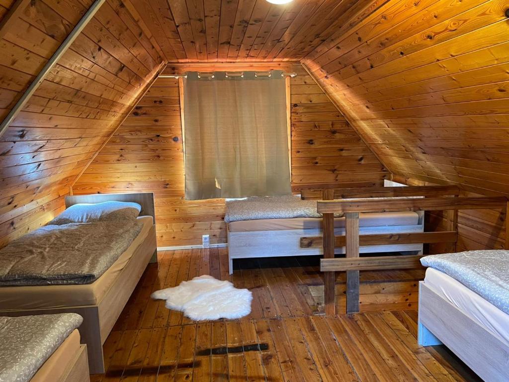 Postel nebo postele na pokoji v ubytování Sport resort Nenudimse
