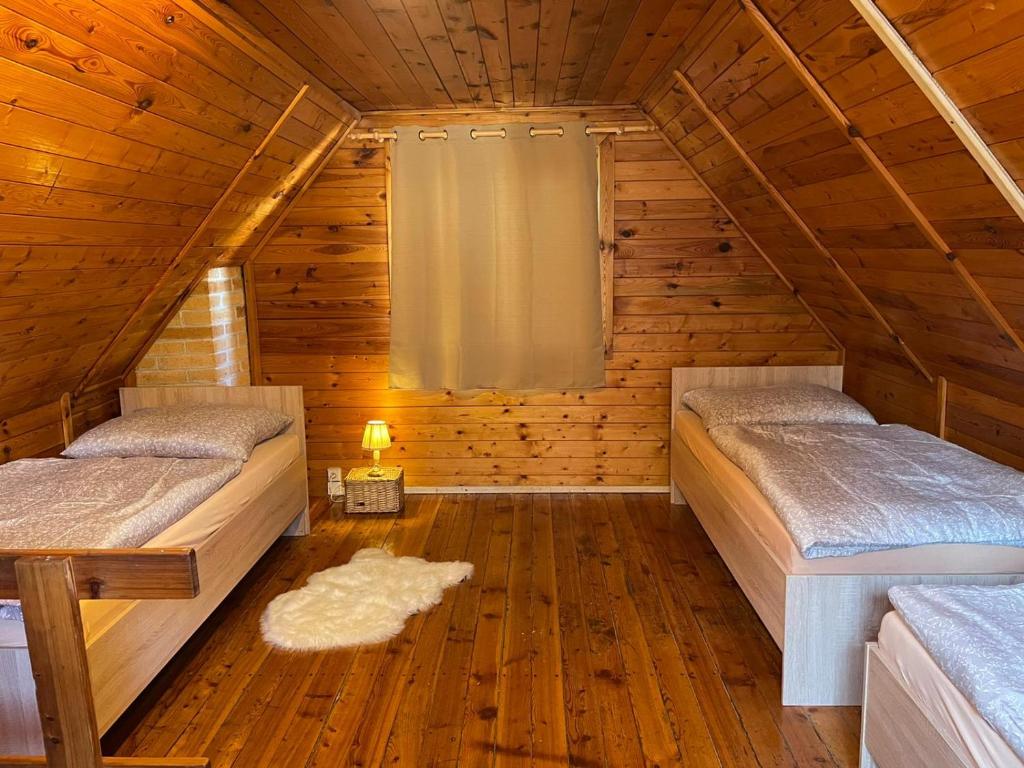 Postel nebo postele na pokoji v ubytování Sport resort Nenudimse