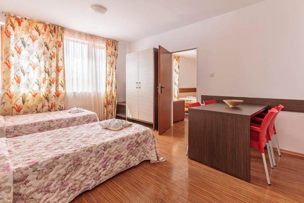 Postel nebo postele na pokoji v ubytování Guest Apartments Co Morenia