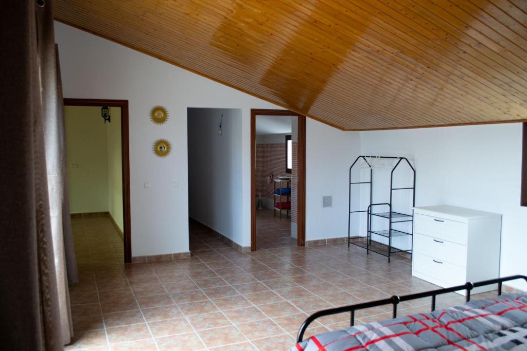 Postel nebo postele na pokoji v ubytování Alojamiento Rural MAGALAN