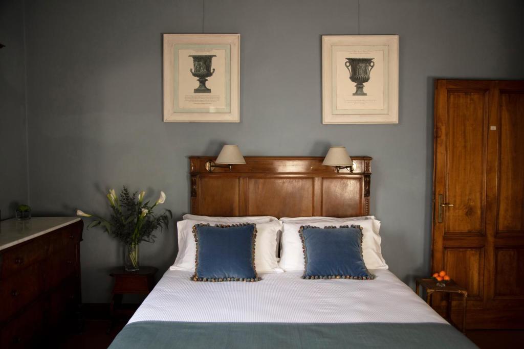 Postel nebo postele na pokoji v ubytování Hotel Palazzo Guadagni