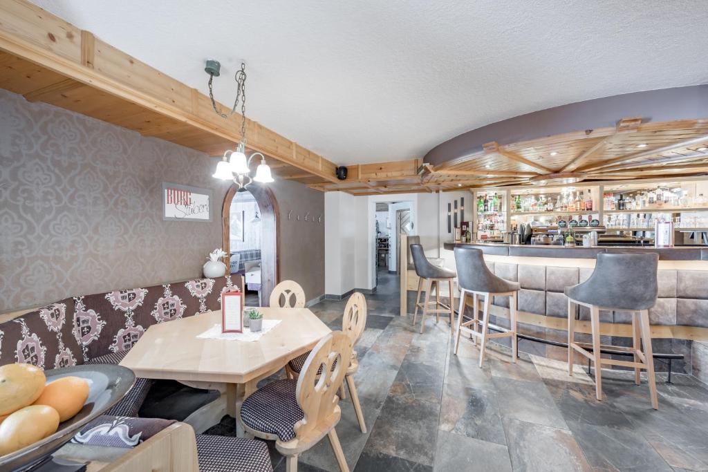 Posedenie v ubytovaní Burghotel Alpenglühn