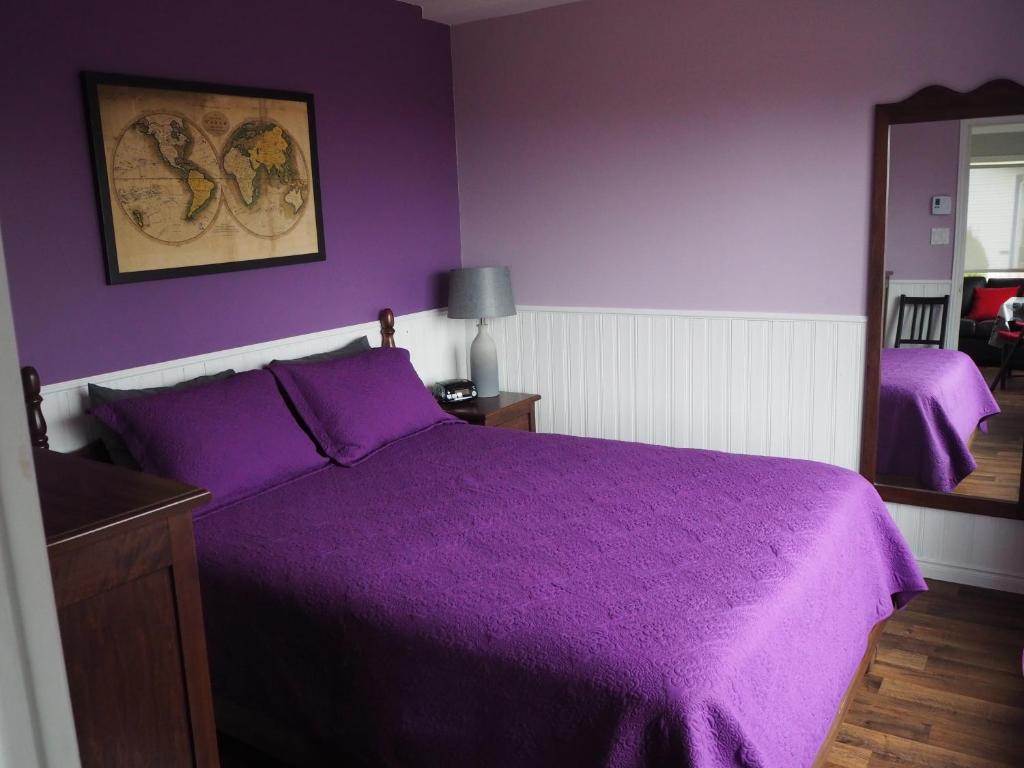 Voodi või voodid majutusasutuse Auberge Fleurs de Lune toas