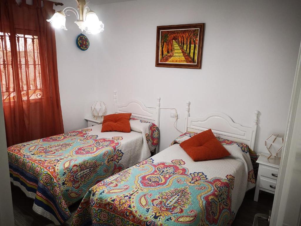 Postel nebo postele na pokoji v ubytování Casa rural en Torrecuevas