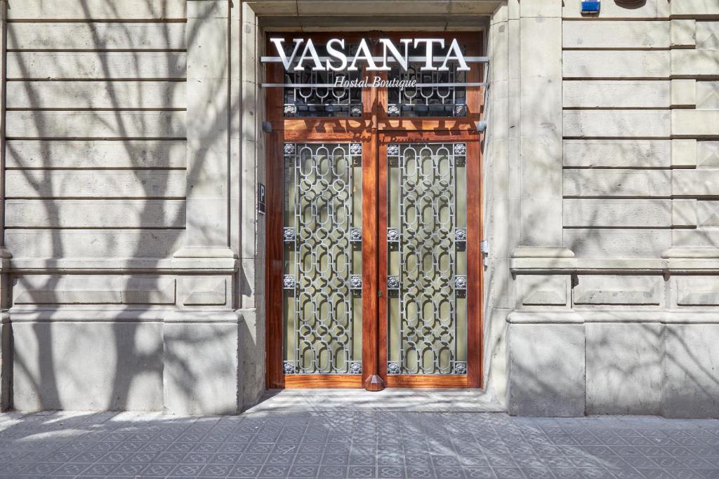 a door leading to a building with a large window at Sonder Vasanta in Barcelona
