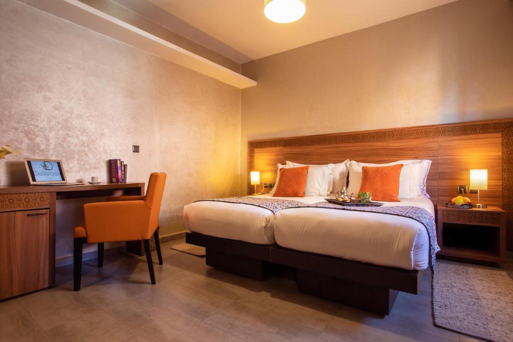 Postel nebo postele na pokoji v ubytování Dellarosa Boutique Hotel and Spa