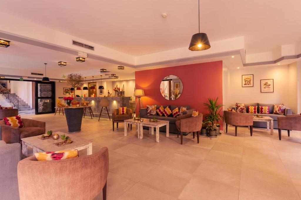 Posezení v ubytování Dellarosa Boutique Hotel and Spa
