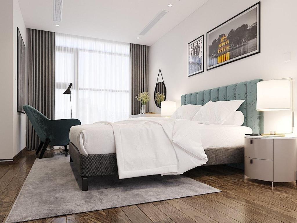Letto o letti in una camera di Aspaces Serviced Apartments - Vinhomes West Point