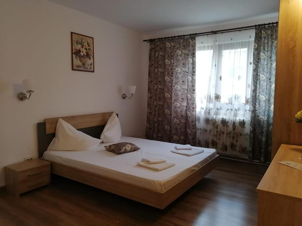 Postel nebo postele na pokoji v ubytování Hotel Dacor