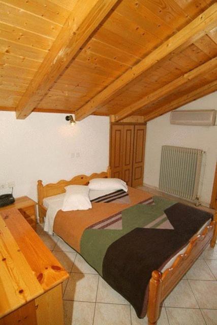 Postel nebo postele na pokoji v ubytování Hotel Orfeas