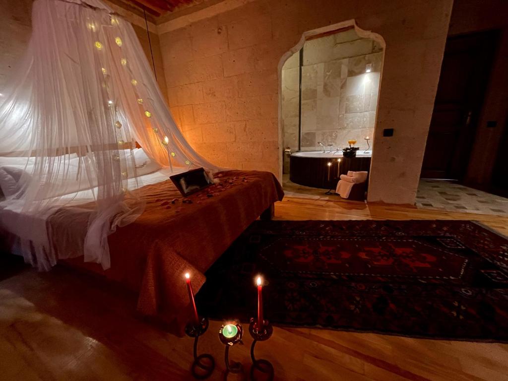 A bed or beds in a room at Alice in Cappadocia