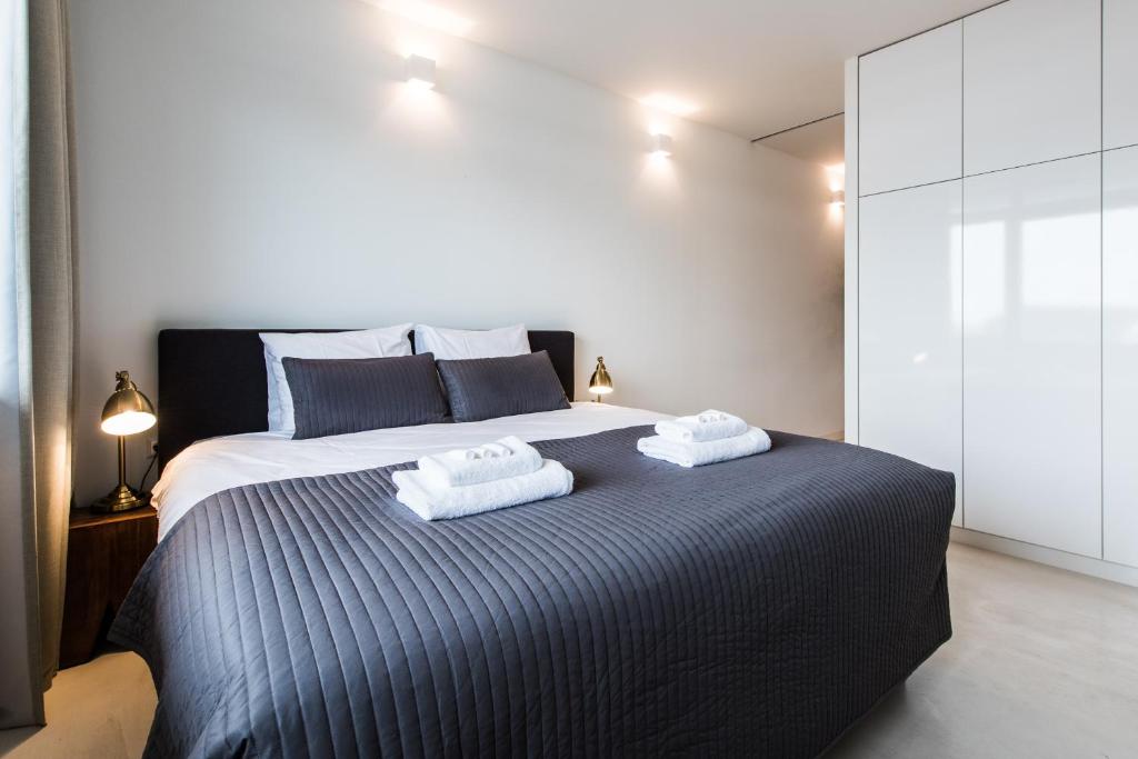 Postel nebo postele na pokoji v ubytování Houthavens Apartments