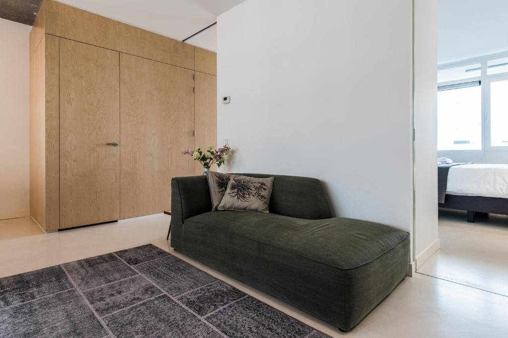 Postel nebo postele na pokoji v ubytování Houthavens Apartments