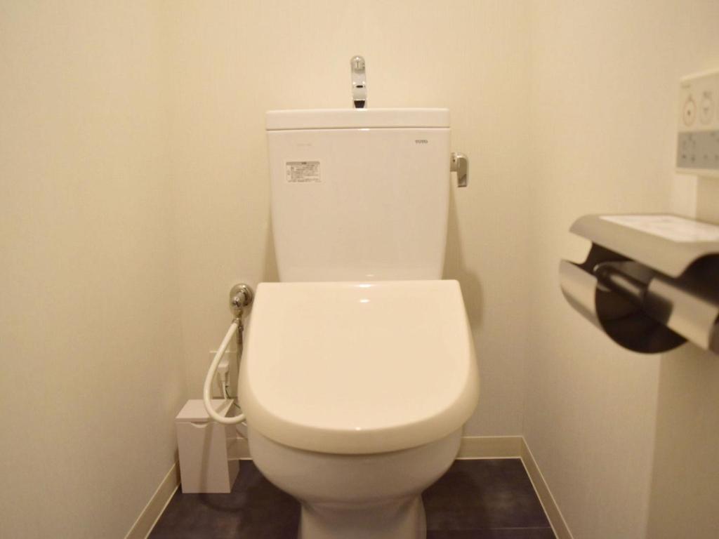 Koupelna v ubytování UMEDAHOLIC HOTEL