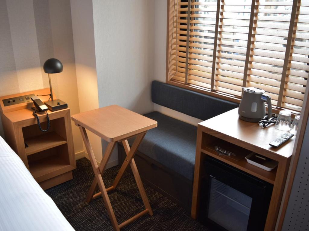 Posezení v ubytování UMEDAHOLIC HOTEL