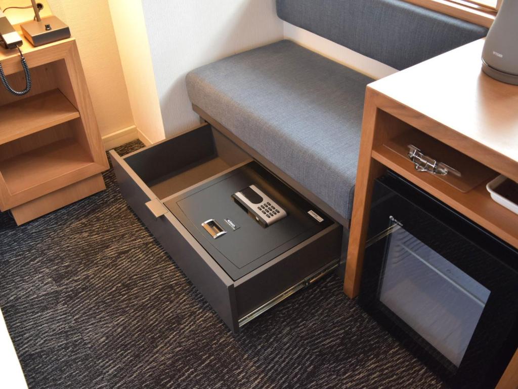 Posezení v ubytování UMEDAHOLIC HOTEL