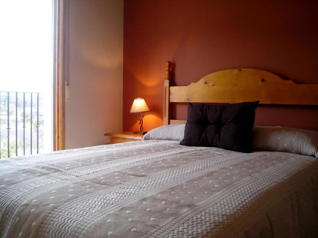 Postel nebo postele na pokoji v ubytování Casa María Jesús