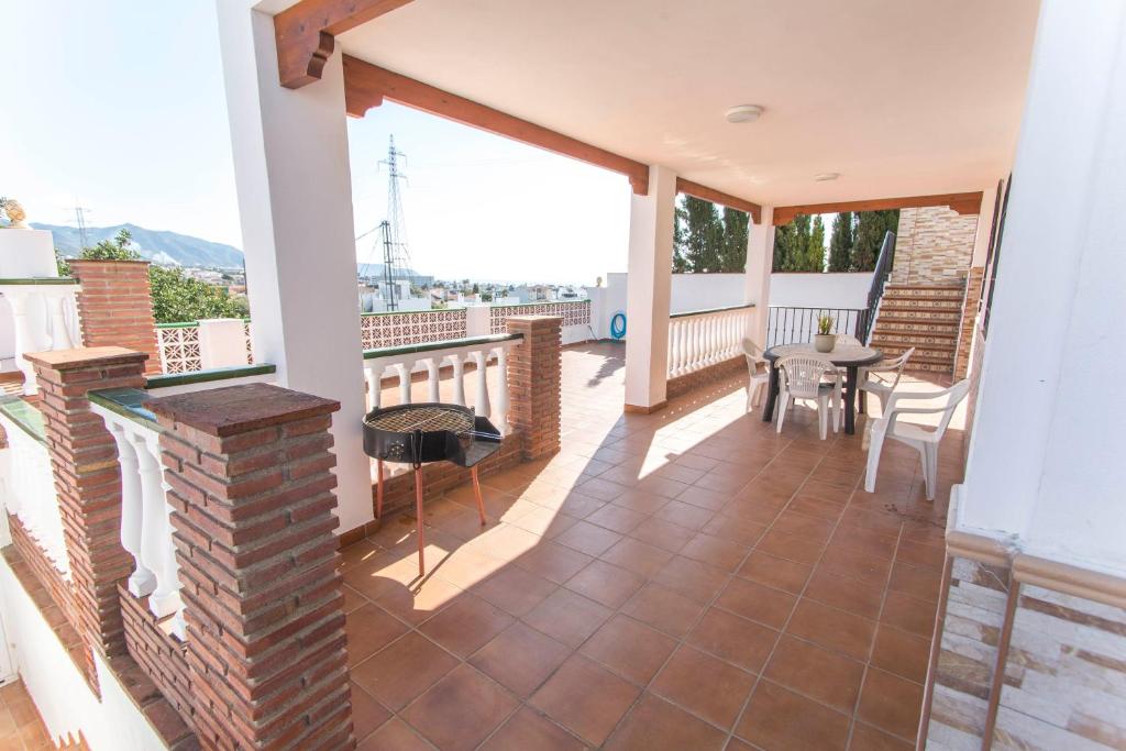A balcony or terrace at Villa Vallao Nerja