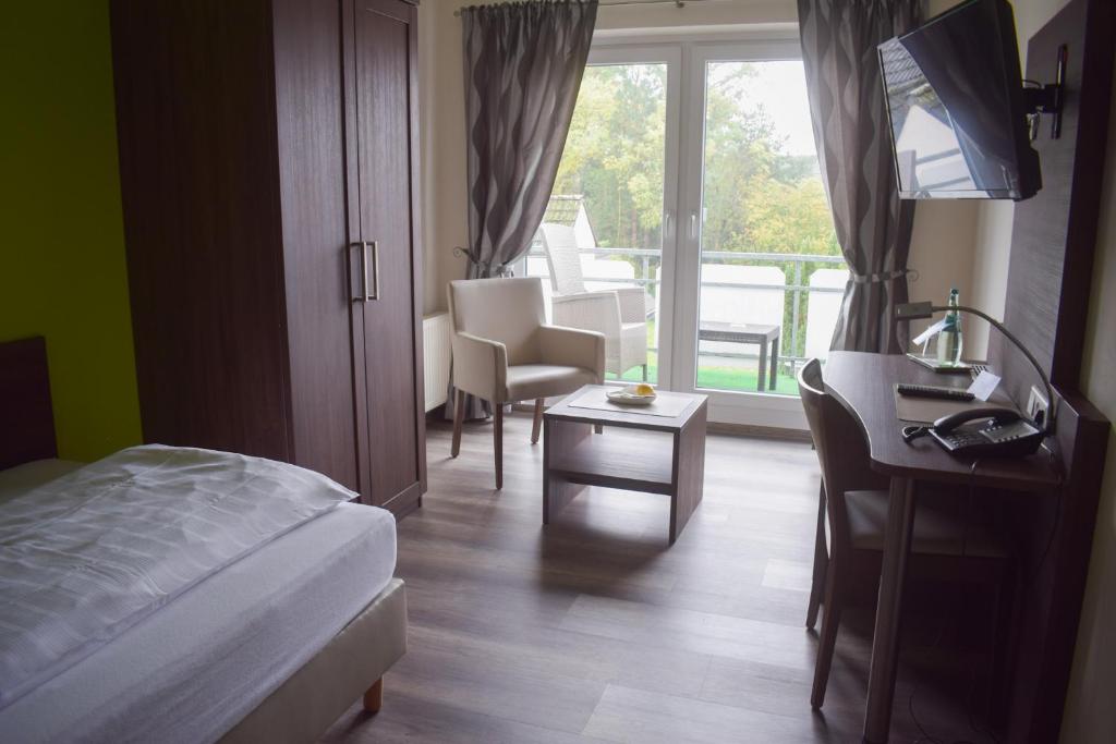 Postel nebo postele na pokoji v ubytování Akzent Hotel Jonathan