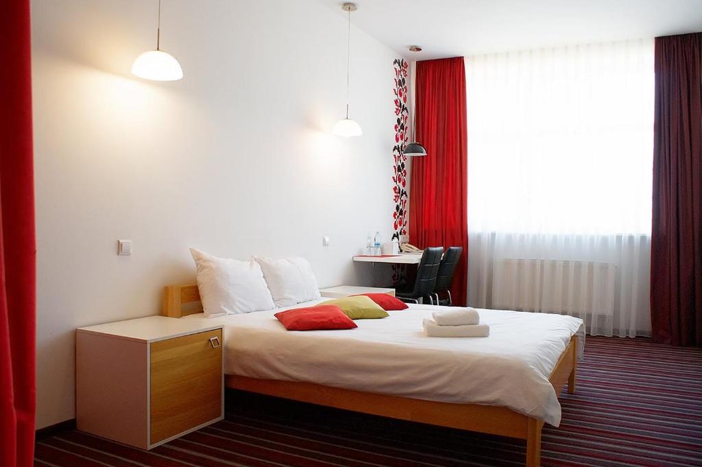 
Кровать или кровати в номере Отель Kalyna
