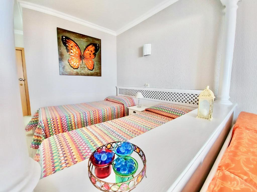 Posteľ alebo postele v izbe v ubytovaní Ocean and Sun Studio Apartment