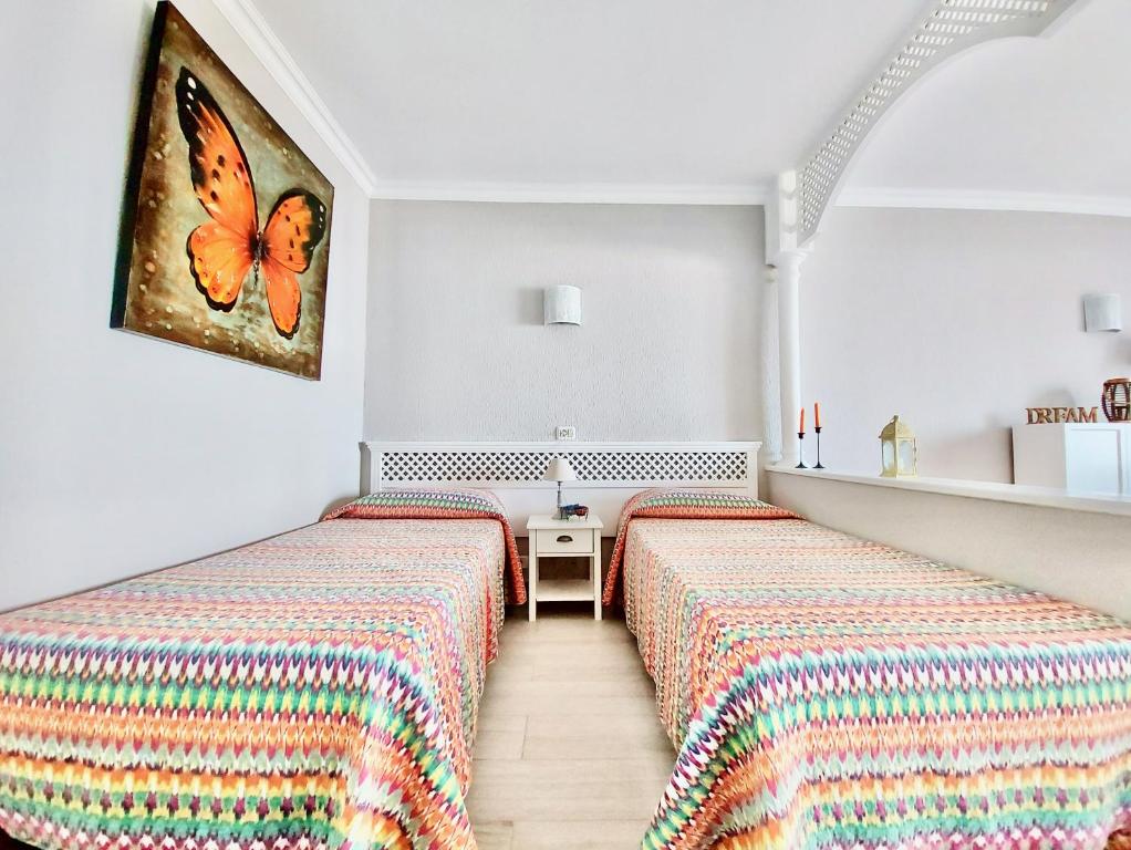 Posteľ alebo postele v izbe v ubytovaní Ocean and Sun Studio Apartment