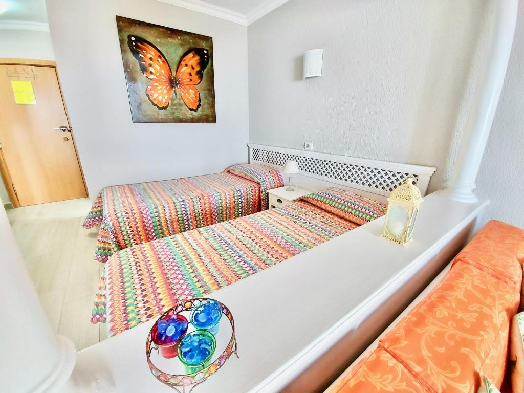 Posteľ alebo postele v izbe v ubytovaní Ocean and Sun Studio Apartment