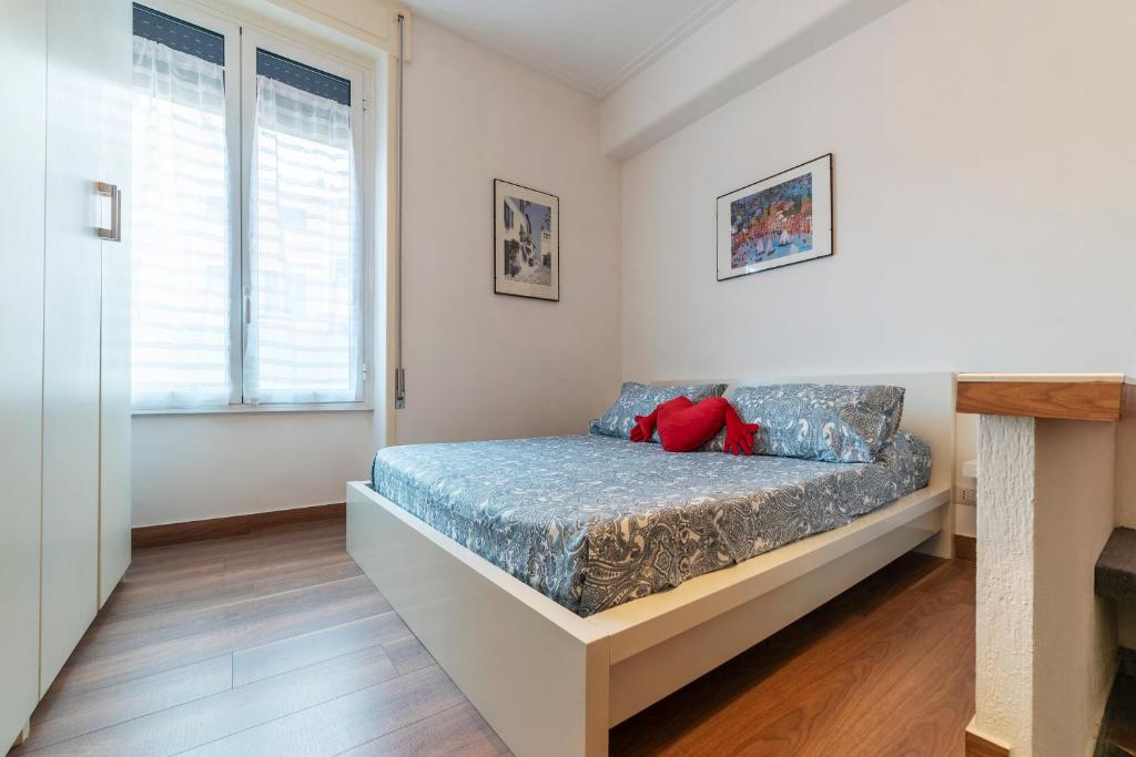 Ένα ή περισσότερα κρεβάτια σε δωμάτιο στο Piazza Bologna Comfortable Apartments