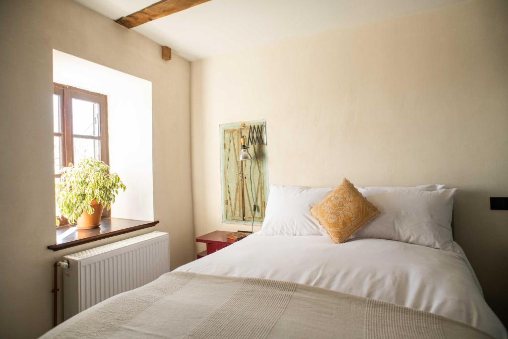 Postel nebo postele na pokoji v ubytování Philos Guesthouse