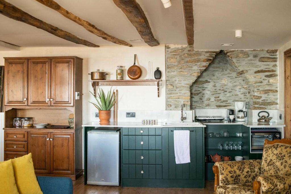 Kuchyň nebo kuchyňský kout v ubytování Philos Guesthouse