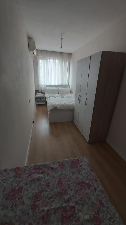 Postel nebo postele na pokoji v ubytování Dilmac Hotel