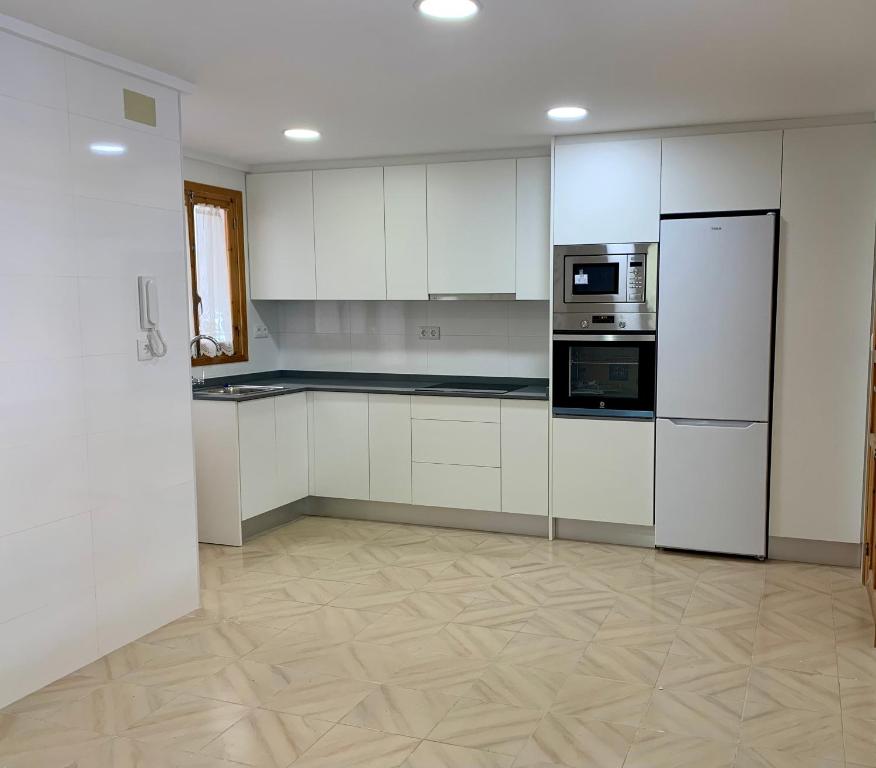Kuchyň nebo kuchyňský kout v ubytování Apartamento frente al mar en El Campello