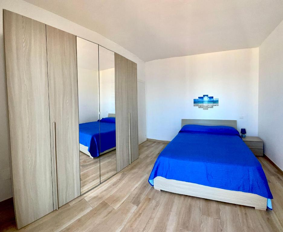 A bed or beds in a room at Viva Vista Mare Bilo Secondo Piano Vista