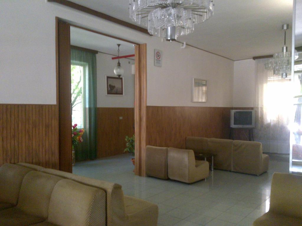 TV a/nebo společenská místnost v ubytování Hotel Elvira