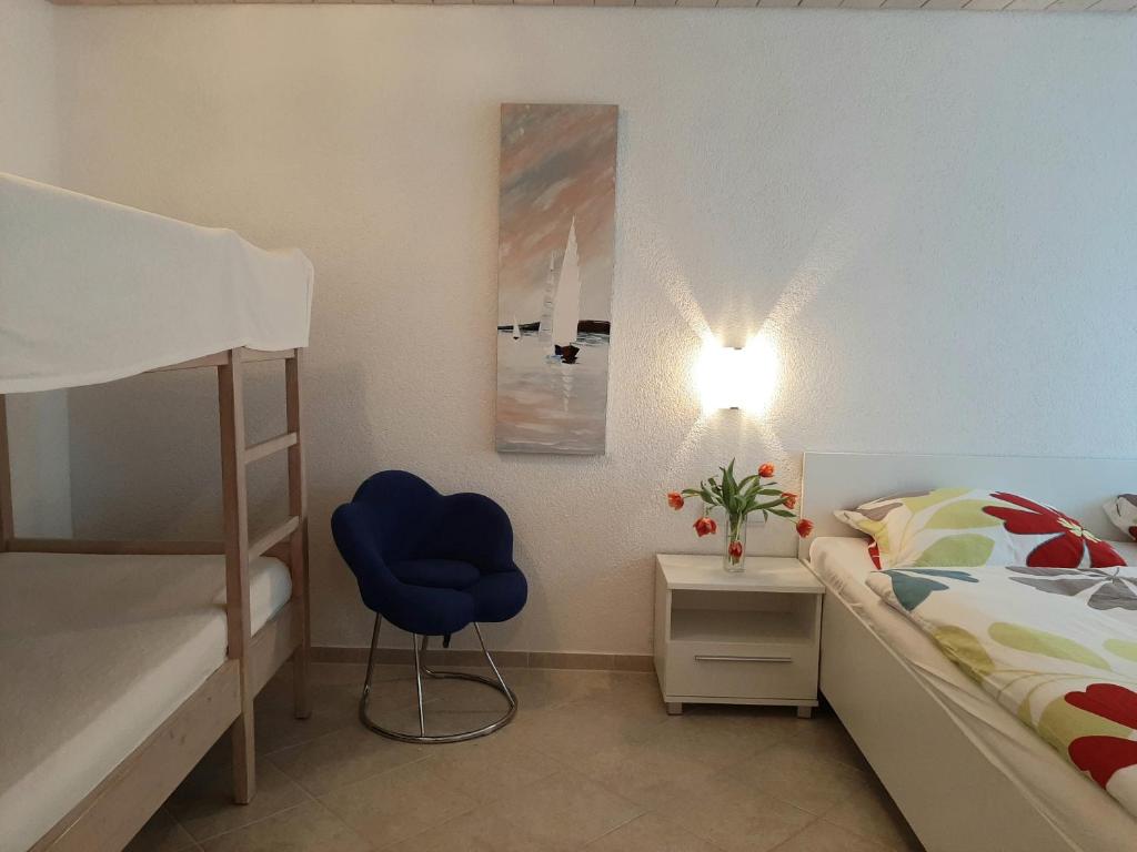 Posteľ alebo postele v izbe v ubytovaní Traum Ferienwohnung mit Pool am Meer, Kroatien, Istrien, Liznjan bis 6 Personen, Urlaub an der Adria