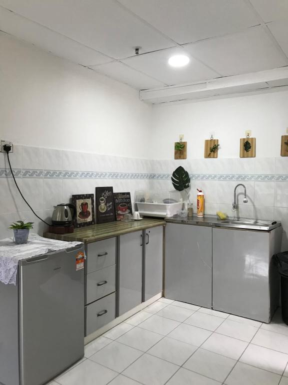 Kuchyň nebo kuchyňský kout v ubytování coralbay apartment pangkor island