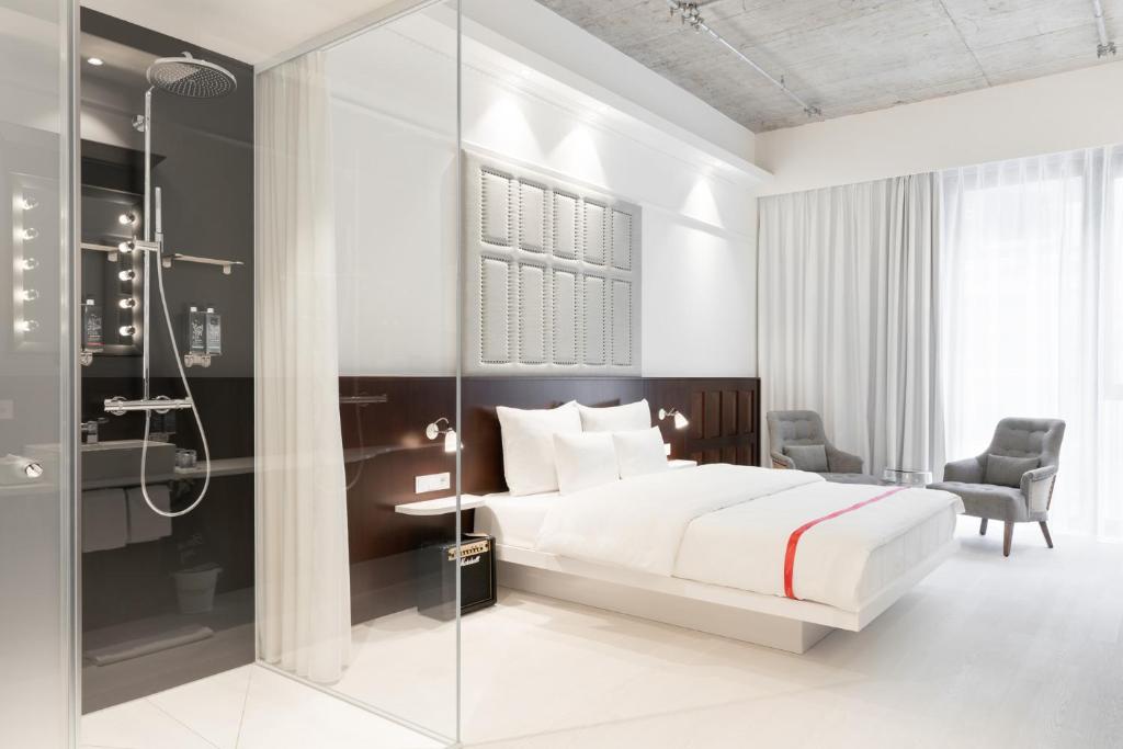 Ένα ή περισσότερα κρεβάτια σε δωμάτιο στο Ruby Louise Hotel Frankfurt