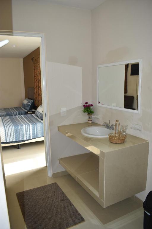 Postel nebo postele na pokoji v ubytování Hotel D’Cural