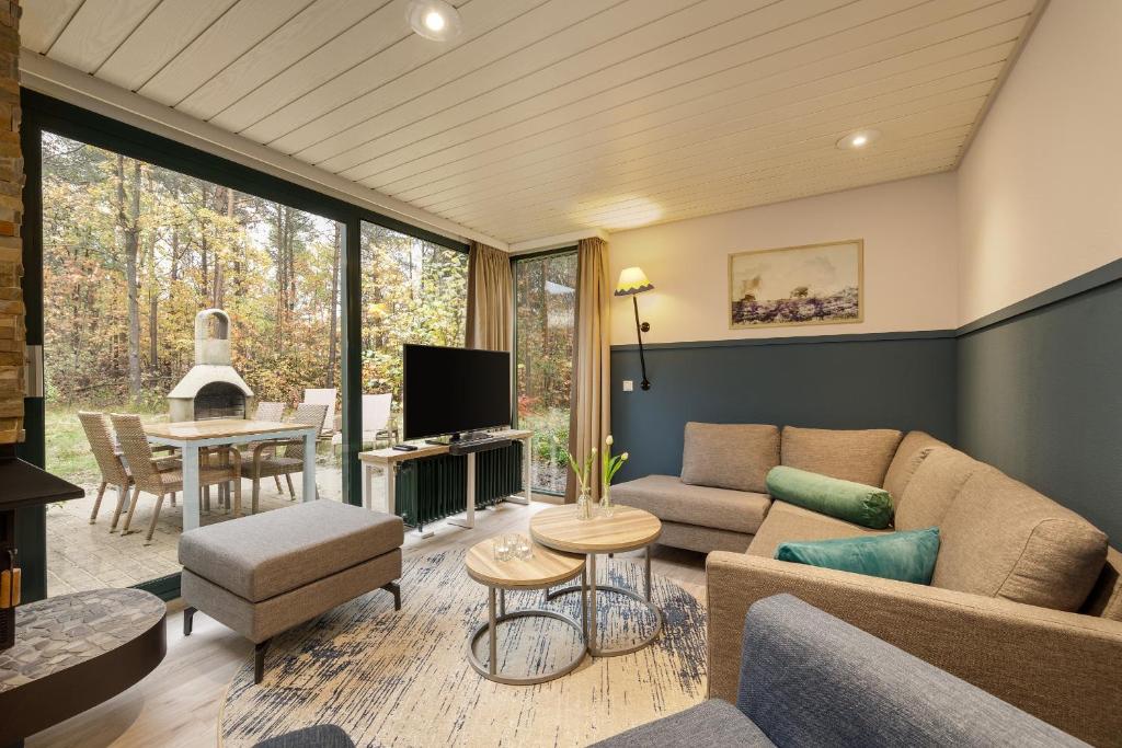 TV a/nebo společenská místnost v ubytování Center Parcs Bispinger Lüneburger Heide